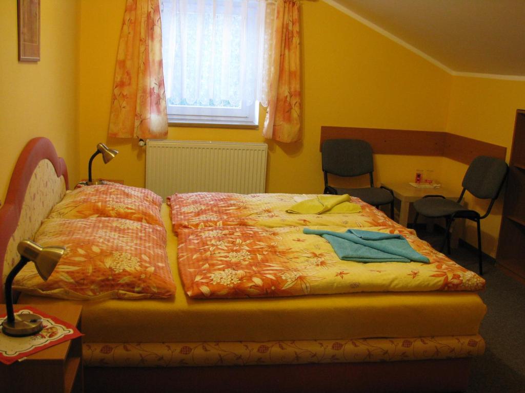 Postel nebo postele na pokoji v ubytování Boháček