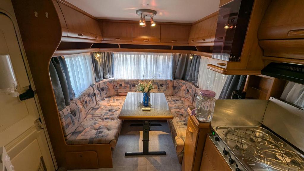 an interior view of a small table in an rv at Mikael's Bed & Spa - Camping Suite in Sandefjord