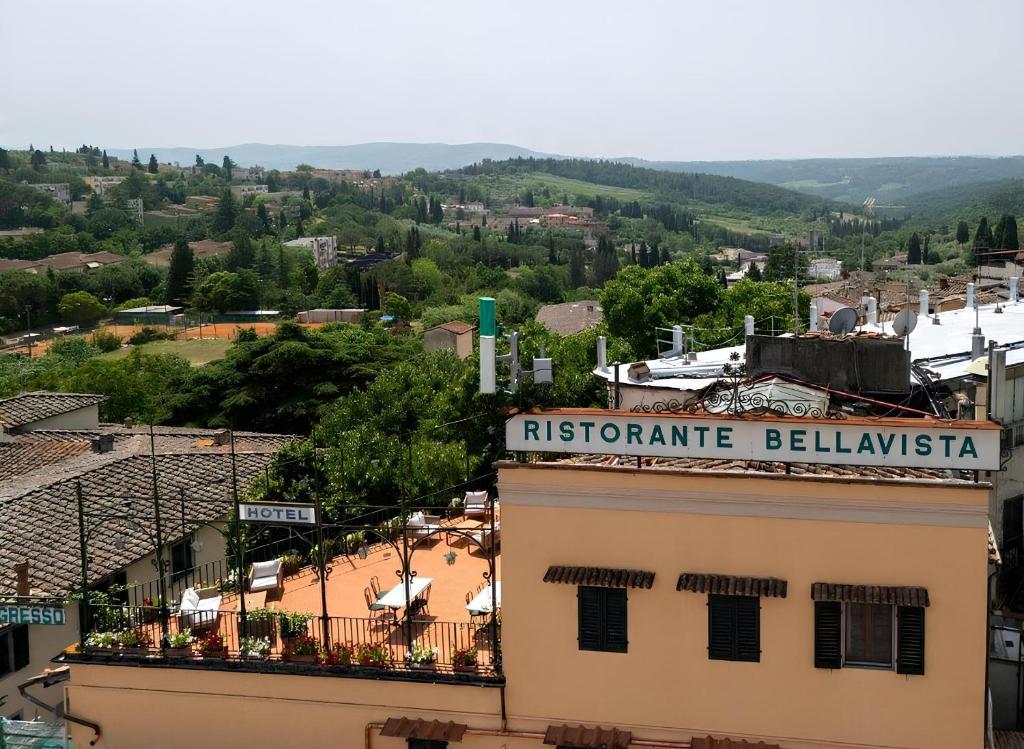 a building with a sign on top of it at Hotel Bellavista Impruneta in Impruneta