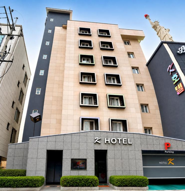 a hotel in front of a building at Cheonan K Hotel in Cheonan