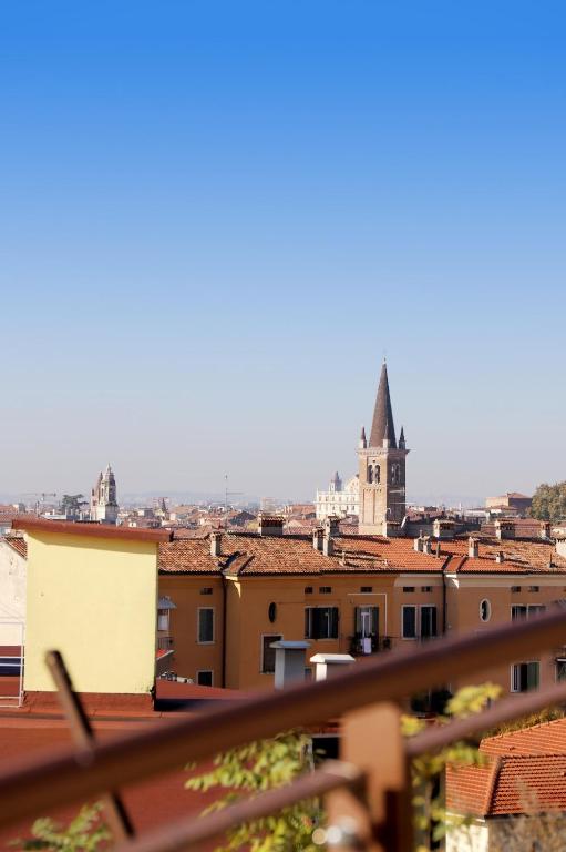 a view of a city with a church in the distance at Stelle di Verona - Selene in Verona