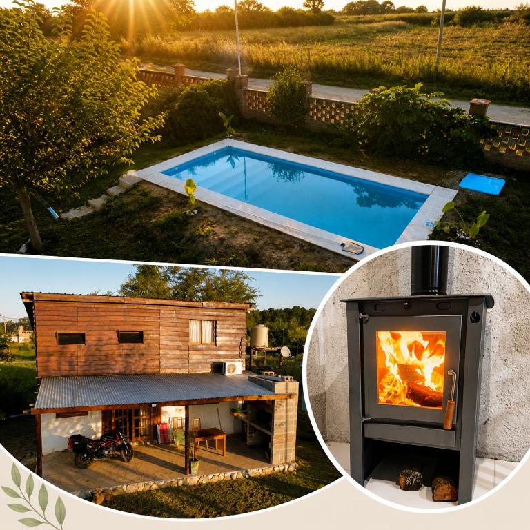a house with a fireplace next to a swimming pool at Cabaña Mitimay in Alta Gracia