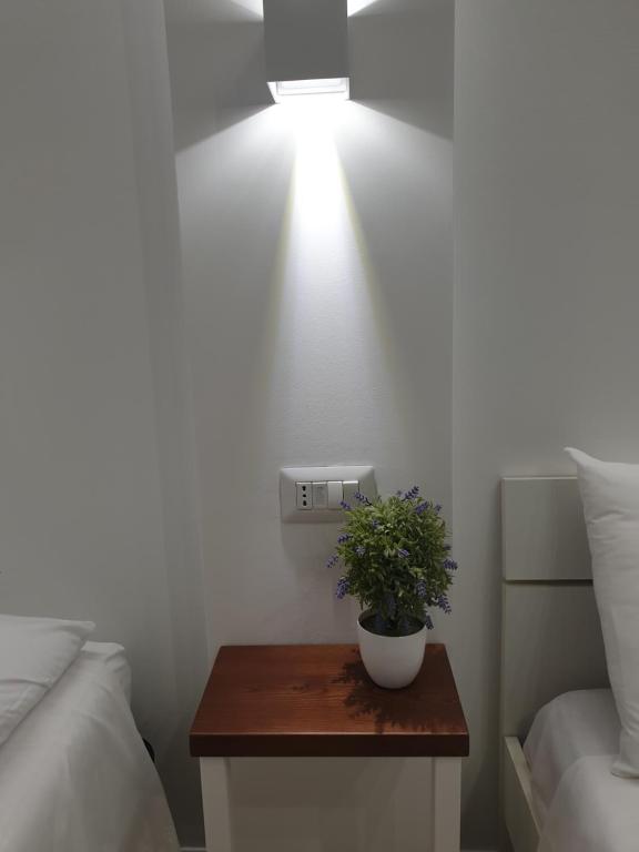 Camera Deluxe con Balcone: letto matrimoniale e luce naturale