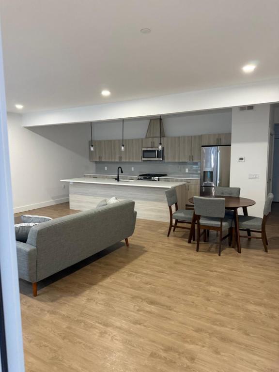 a living room with a couch and a table at Coral Sands in Seaside Heights