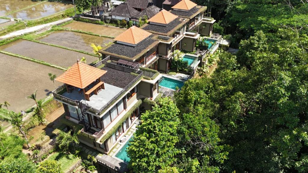 an aerial view of a house with a swimming pool at ElForest Villa Ubud, Payangan in Payangan
