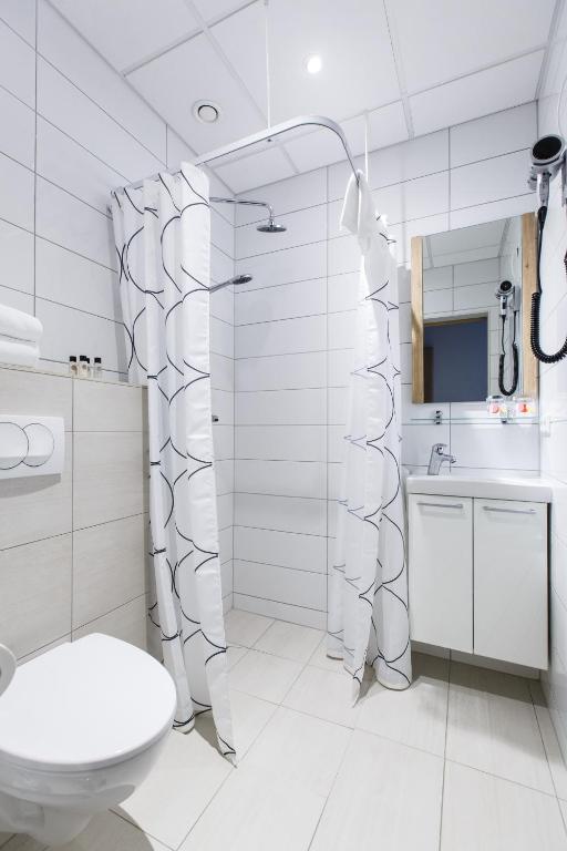 Un baño de Centrum Hotel