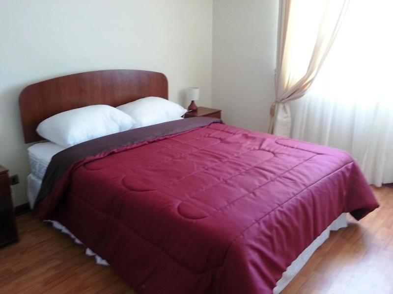 Postel nebo postele na pokoji v ubytování Hospedaje Rancagua - Centro - Hermoso Departamento