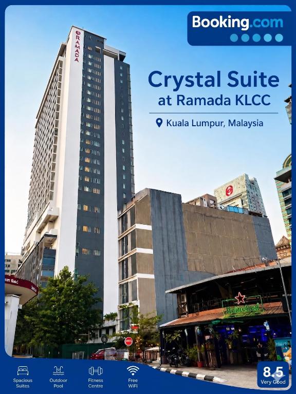 a tall building in the middle of a city at Crystal Suites at Ramad KLCC in Kuala Lumpur