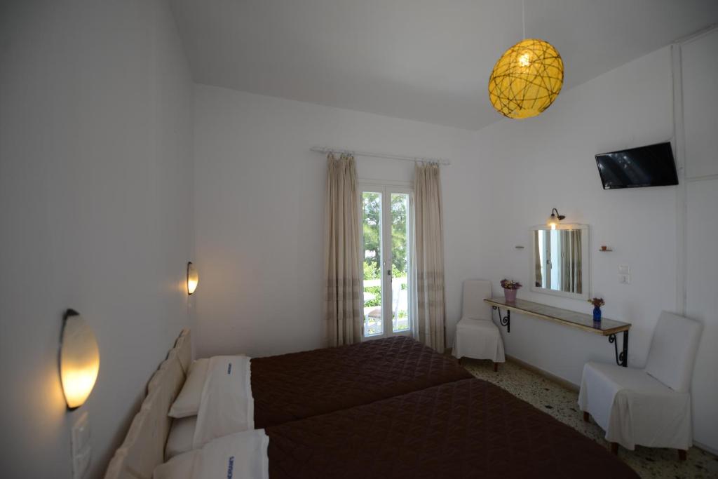 Voodi või voodid majutusasutuse Andriani's Guest House toas