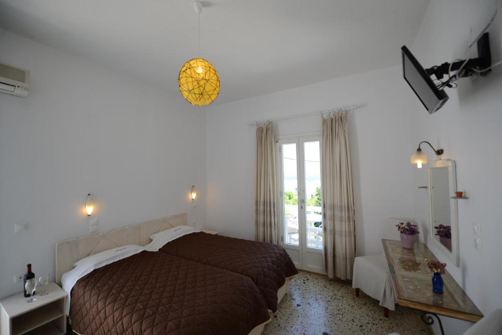Voodi või voodid majutusasutuse Andriani's Guest House toas