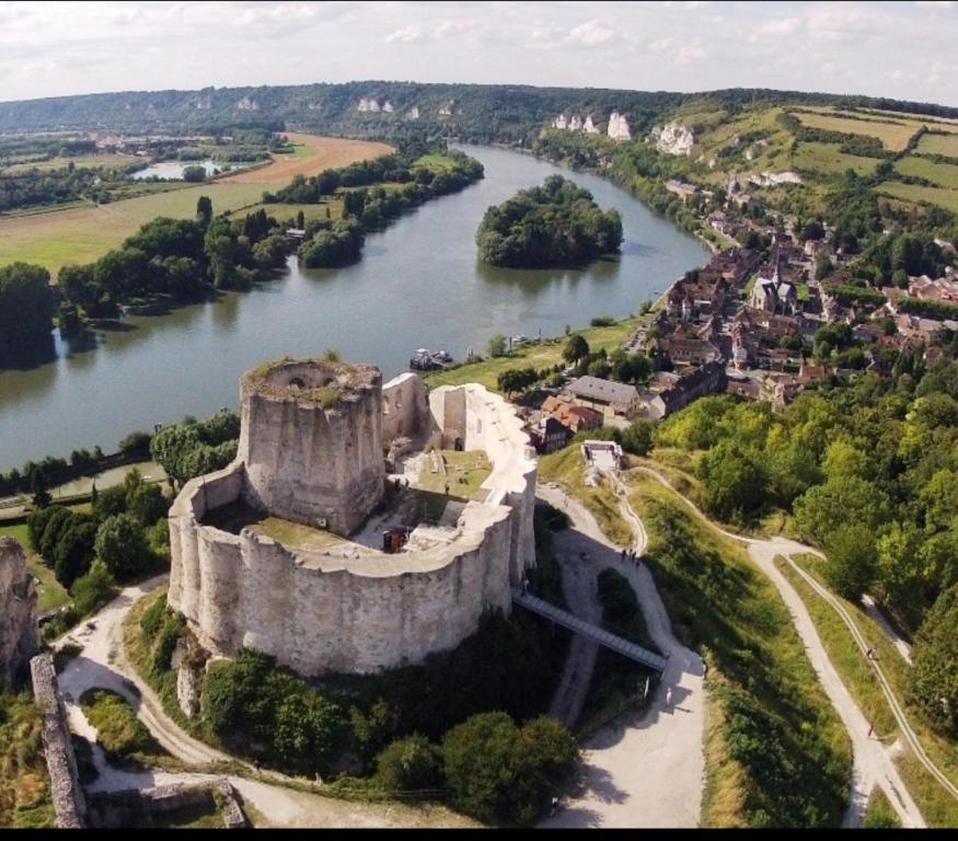 an aerial view of an old castle next to a river at Cosy travels in Les Andelys