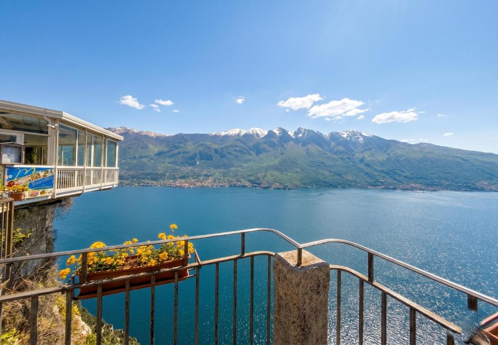 a view of a lake with mountains in the background at Casa Claudia Pieve centro storico in Tremosine Sul Garda