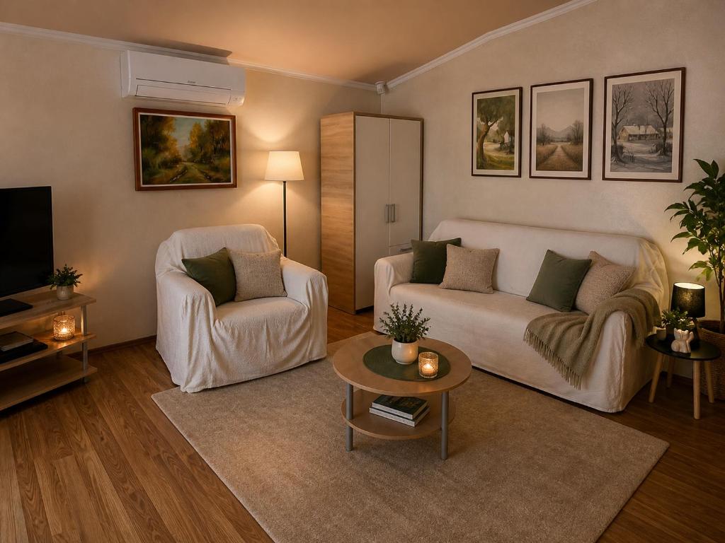 a living room with a couch and a table at Apartments Žitna Sun in Vir
