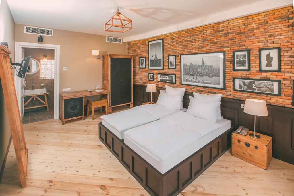 Postel nebo postele na pokoji v ubytování Kisi Boutique Hotel