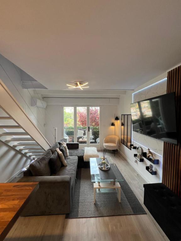 Телевізор і / або розважальний центр в Charmant duplex