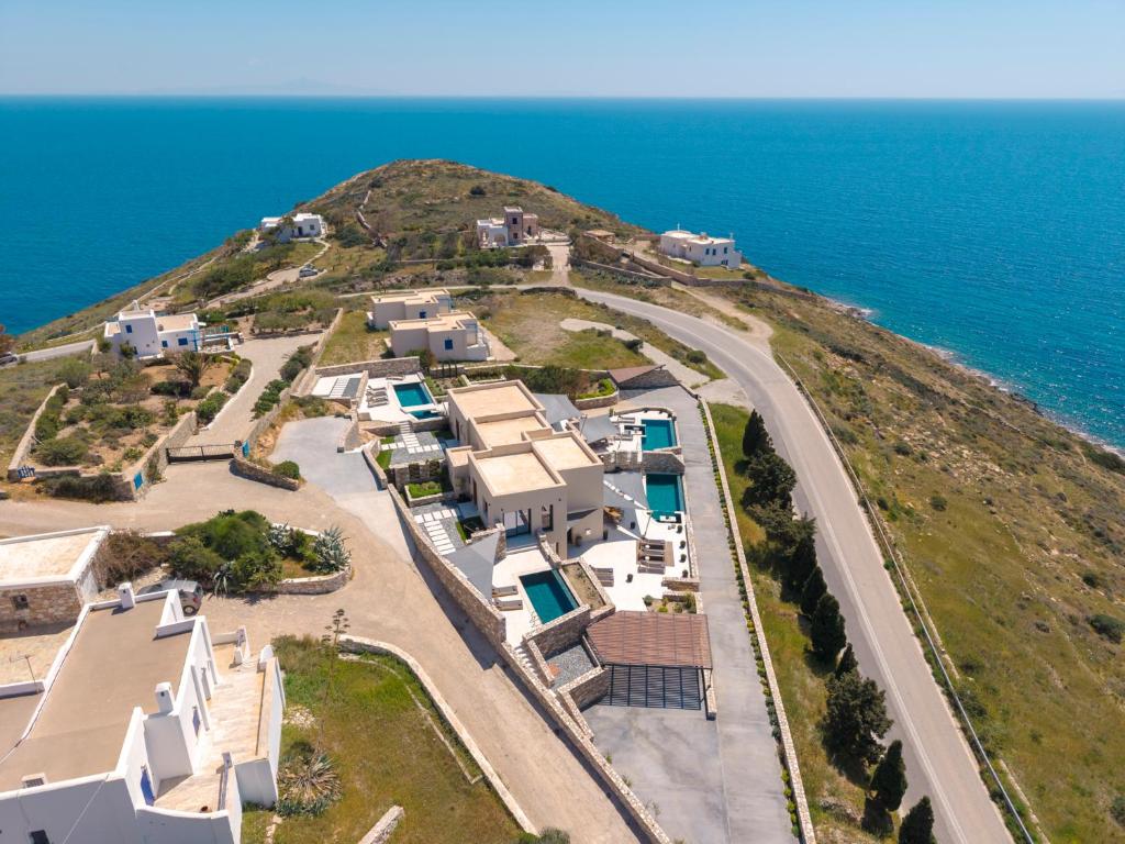 an aerial view of a house on an island at Pnoe Villas Syros in Megas Gialos - Nites