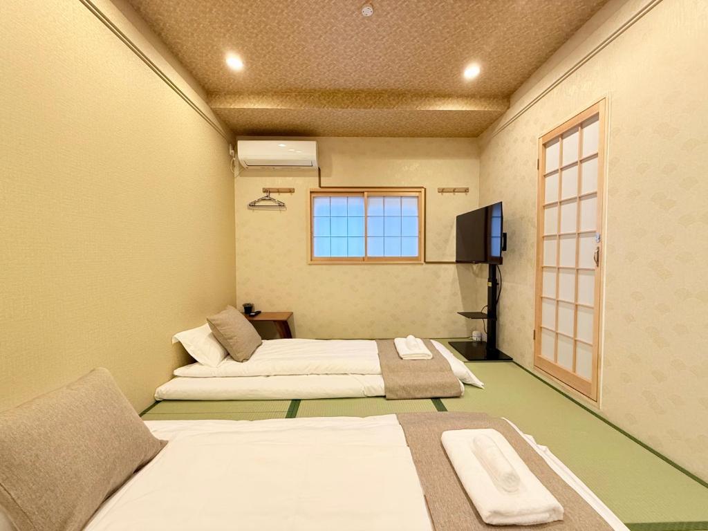 到难波4分钟 机场直达 通天阁 心斋桥 梅田 Usj14分 全新日式 2房1厅1厨2卫2浴 最多5人