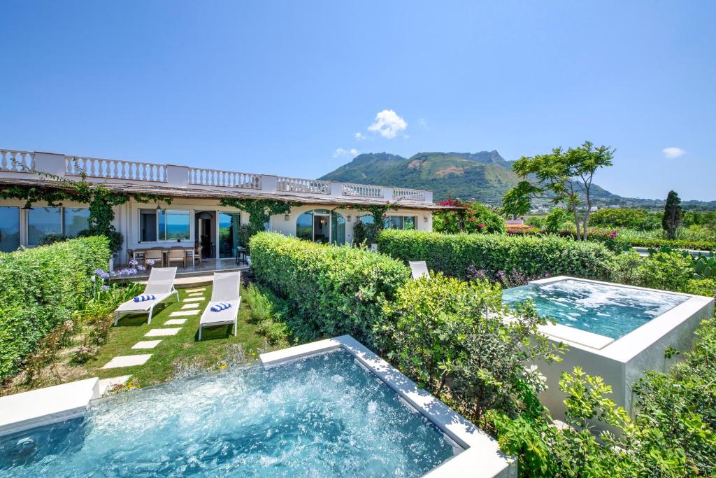 an image of a house with a swimming pool at OraBlu Villas in Forio d'Ischia
