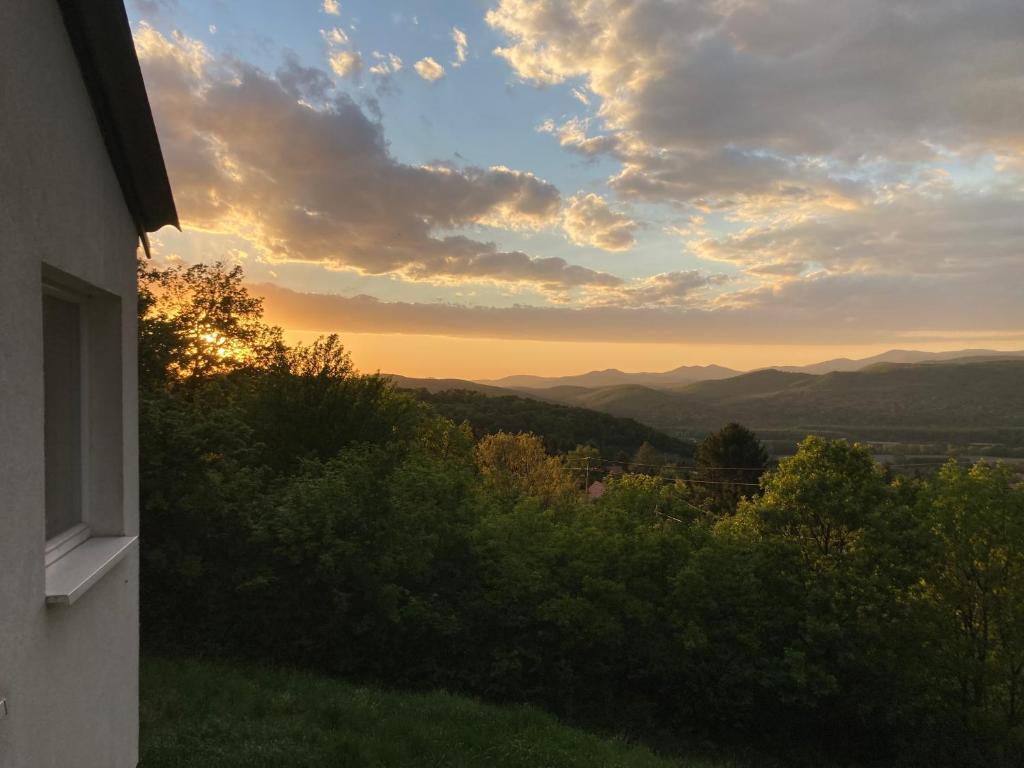 a view of the sunset from a house at Csudahely - WonderPlace in Dunabogdány