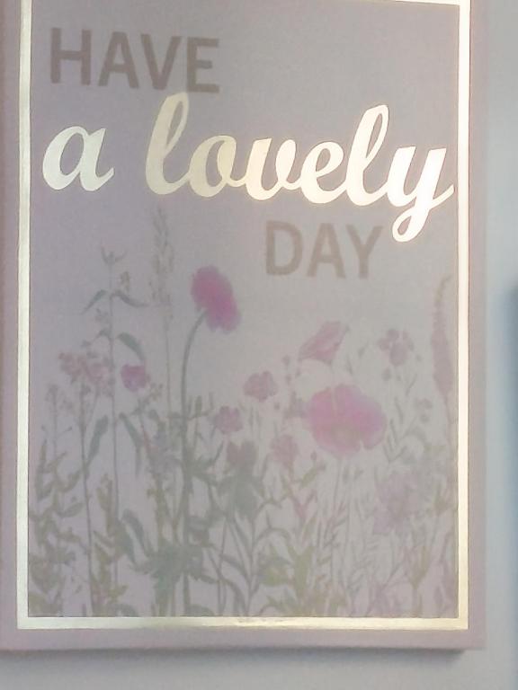 a sign that says have a lovely day with flowers at Jupiter in Split