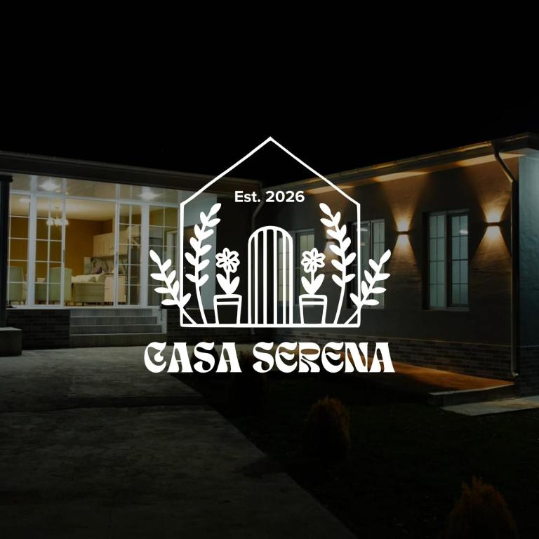 a sign on the side of a building at Casa Serena Sheki in Sheki