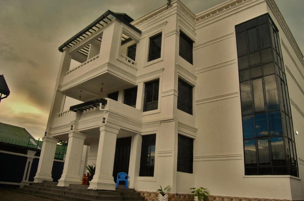 a large white house with at Villaveh Gameview in Nakuru