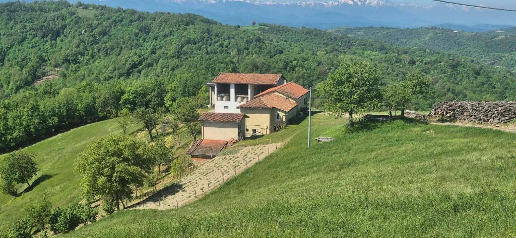 an aerial view of a house on a hill at La Paulotta in Paroldo