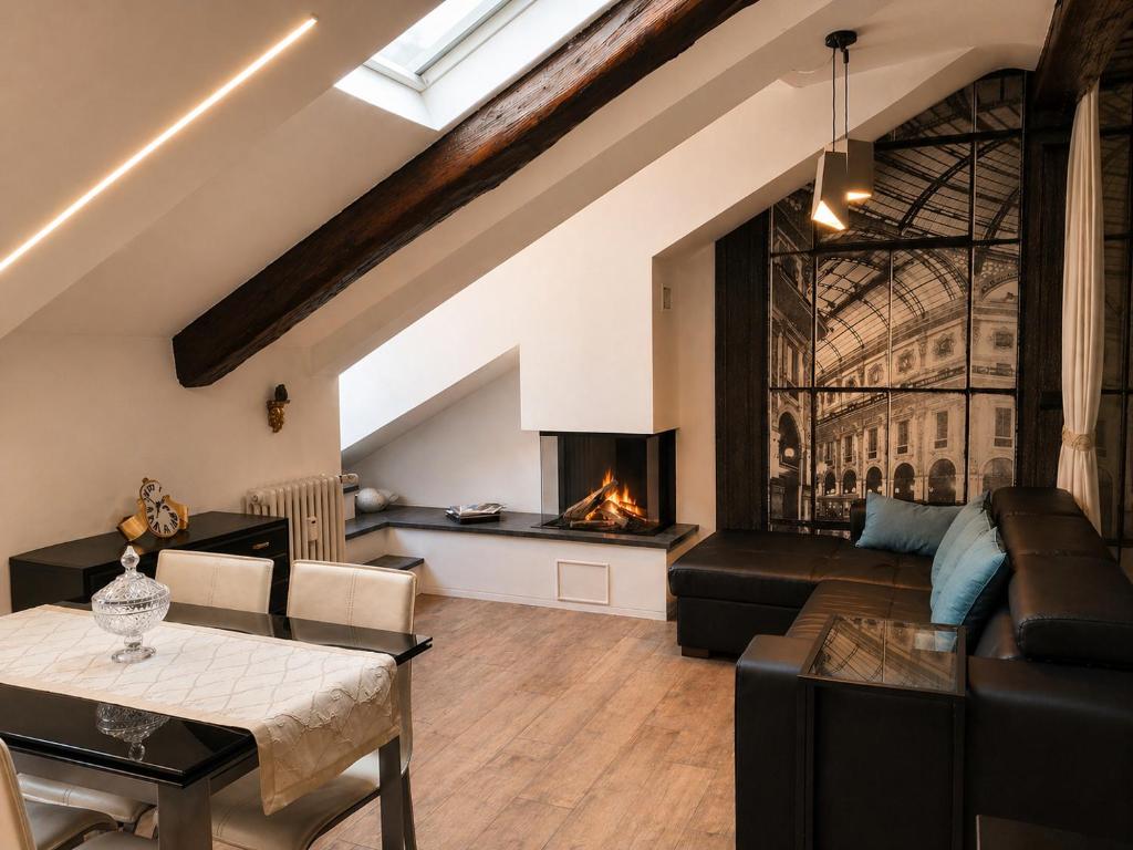 a living room with a couch and a fireplace at Alloggio Fronte Egizio in Turin