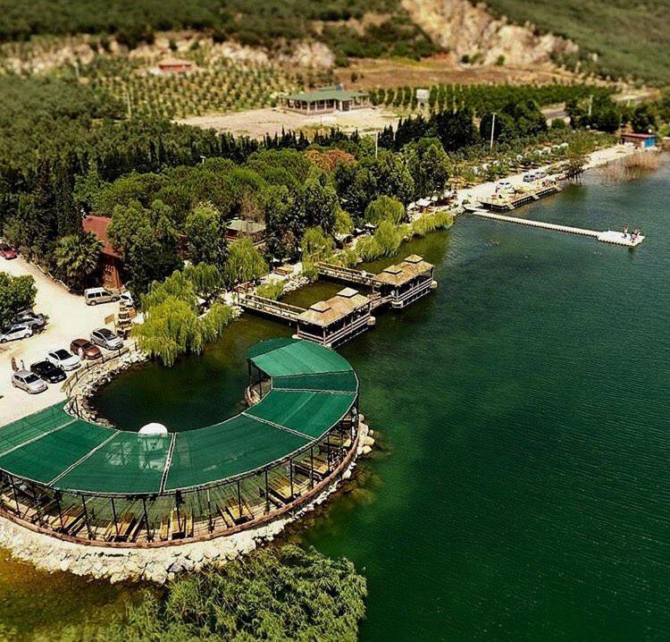 an aerial view of a golf course in the water at Iznik Askania in İznik