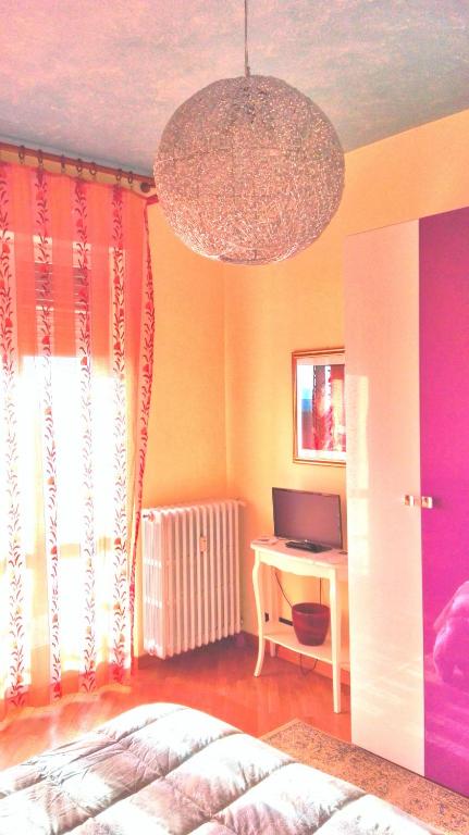 Postel nebo postele na pokoji v ubytování Luna del Belvedere