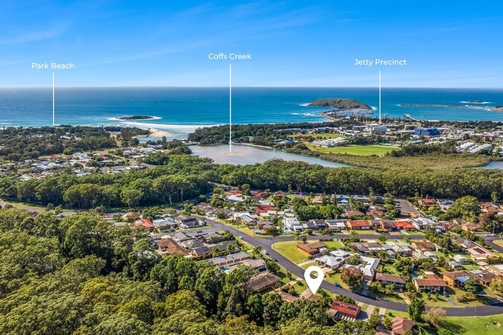 an aerial view of a suburb with the ocean at Brodie Getaway in Coffs Harbour