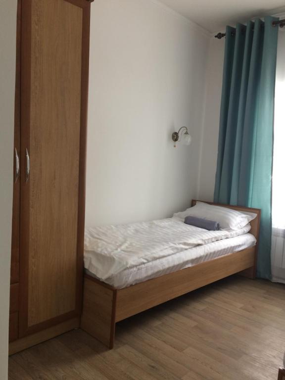 Postel nebo postele na pokoji v ubytování KbH-Karakol based Hostel