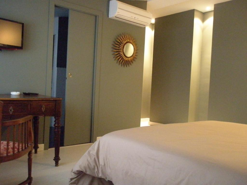 Postel nebo postele na pokoji v ubytování Hostal San Francisco
