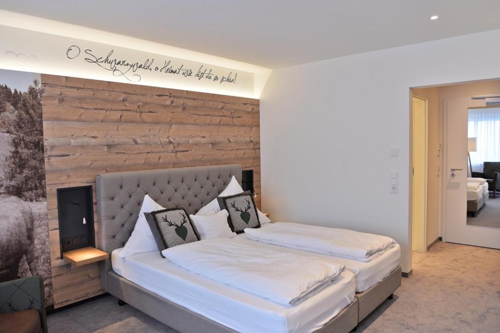 Postel nebo postele na pokoji v ubytování Hotel Hirschen