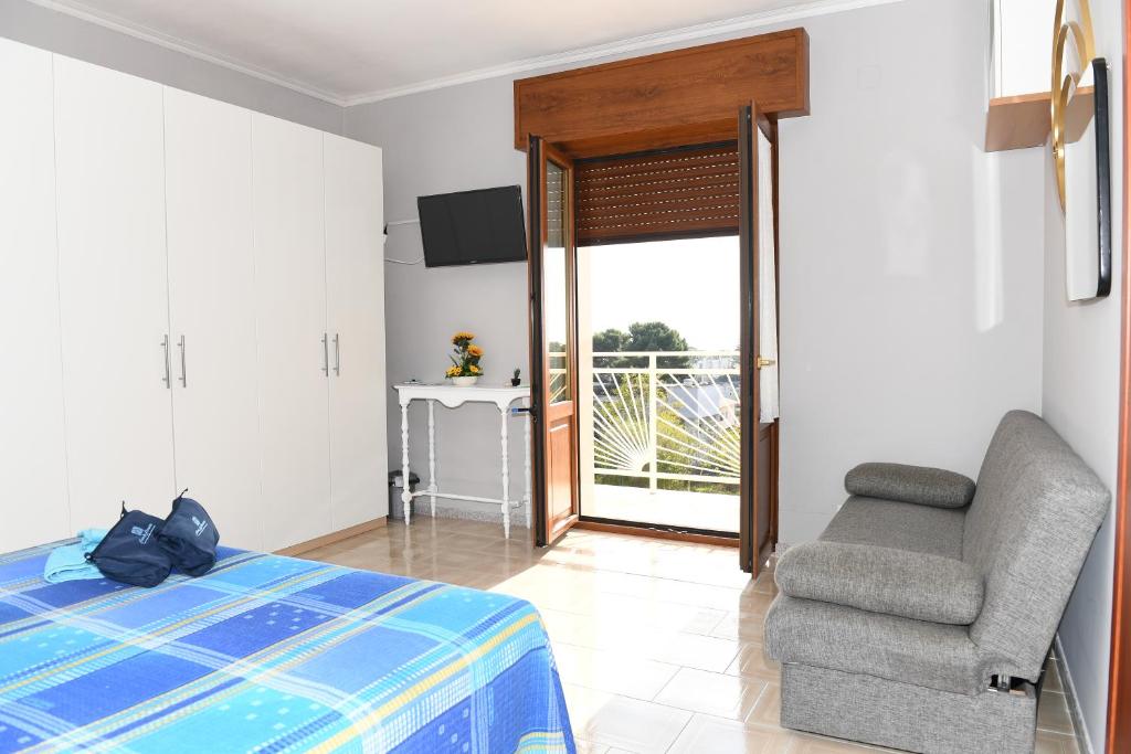 Postel nebo postele na pokoji v ubytování B&B Il Canto Del Mare