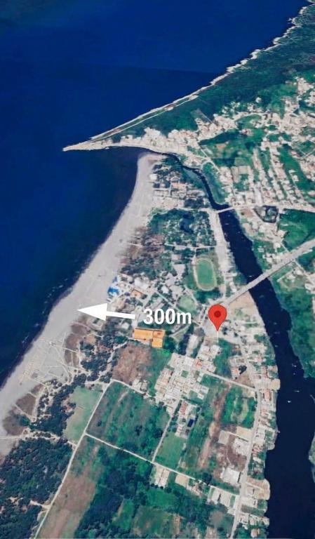 an aerial view of a island with a red heart at Long Beach Truma in Ulcinj