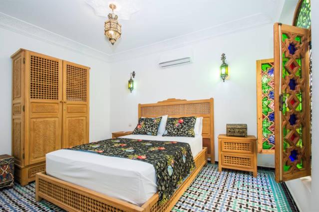 Postel nebo postele na pokoji v ubytování Riad Vega