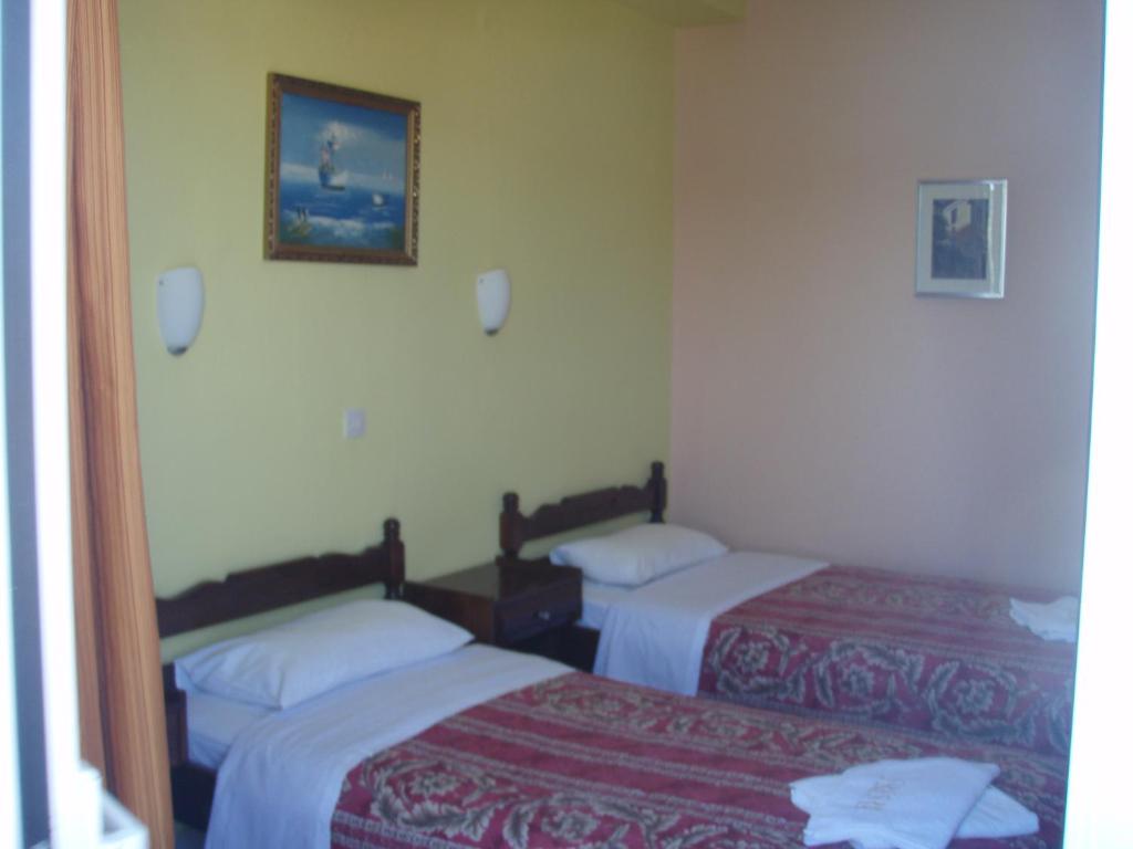 Postel nebo postele na pokoji v ubytování Agnàntema Portside Stays Skiathos