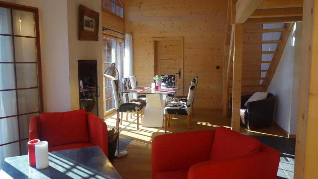 Posezení v ubytování Hotel L'Etable