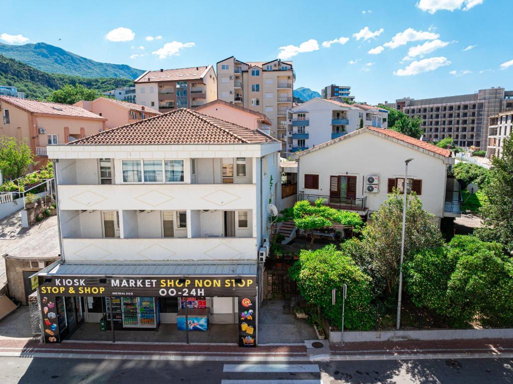 an aerial view of a building in a city at Apartments Bečić in Budva