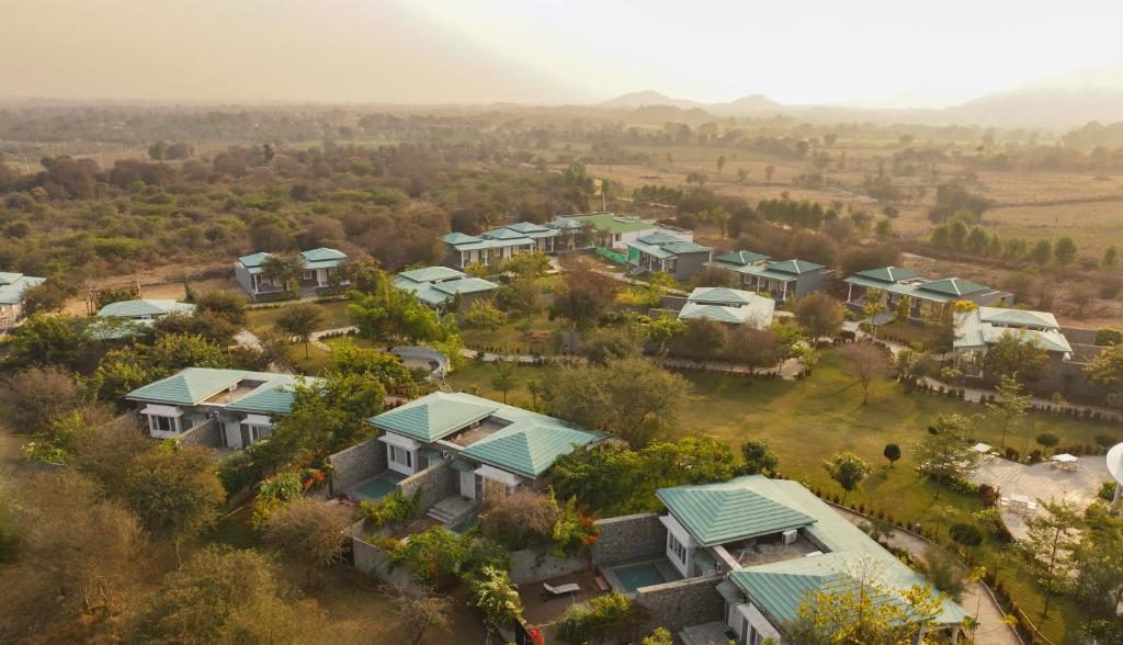 an aerial view of a village with houses at Trulyy The Jawai Leopard Kingdom in Jāmb