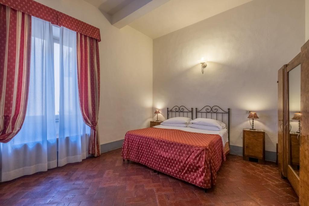 Łóżko lub łóżka w pokoju w obiekcie B&B Home in Florence