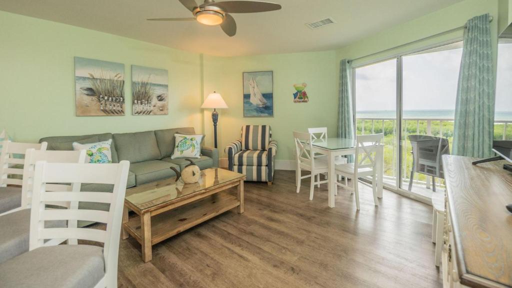 a living room with a couch and a table at 2405 Ocean Pointe Suites in Tavernier