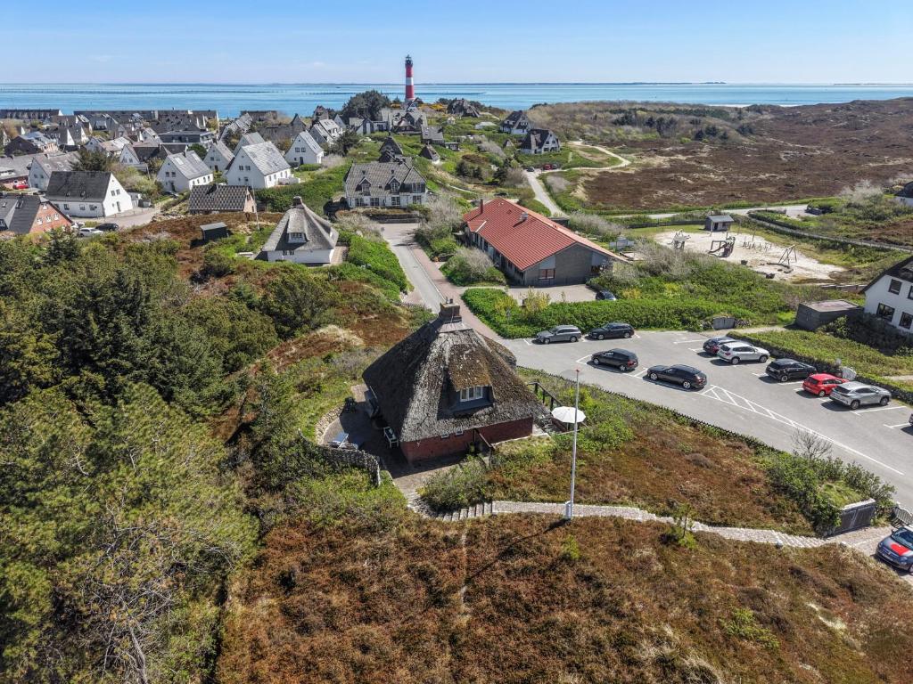 an aerial view of a small town with a house at Düünhuus in Hörnum