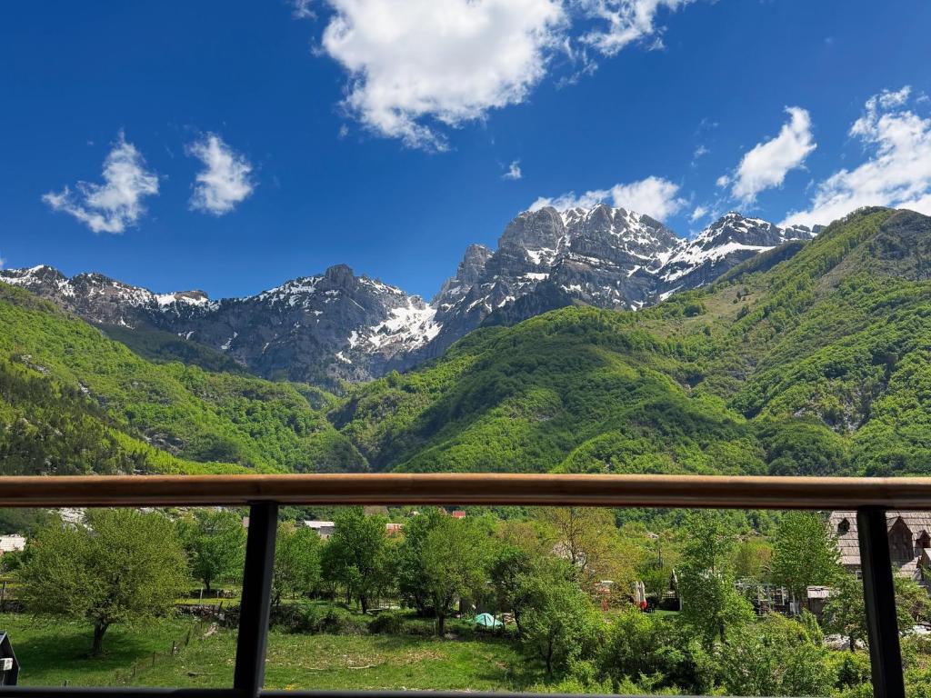 a view of the mountains from a balcony at Vila Shkalla in Theth