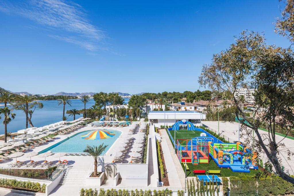a view of the pool at the resort with a playground at VIVA Eden Lago in Port d'Alcudia