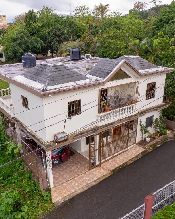 an overhead view of a white house at Brisa del Rio Jimenoa in Jarabacoa