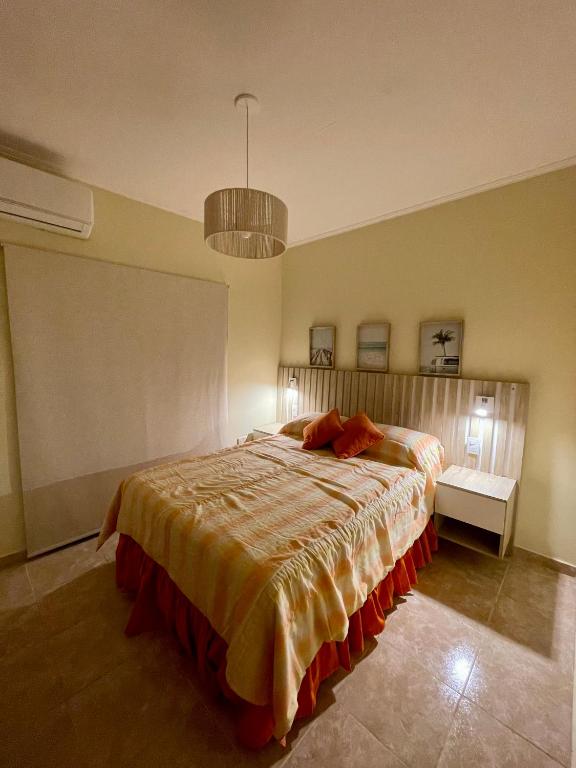 a bedroom with a large bed in a room at Chill Home VIII in Posadas