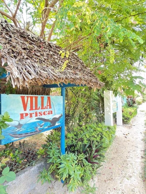 a sign that says villa fiesta in front of a building at Villa Prisca in Sainte Marie
