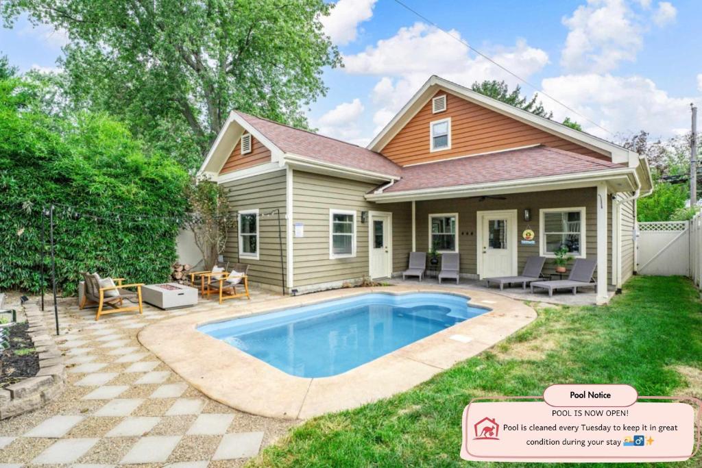 a house with a swimming pool in the yard at The Paper Plane Pool - Sauna - Poker Room - Sleeps 8 in Dayton